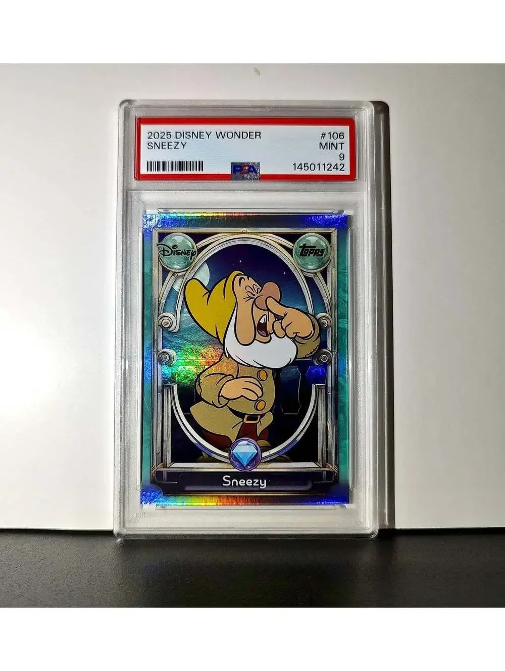 Sneezy 2025 Topps Disney #106 Diamond Card Snow White and the Seven Dwarfs PSA 9